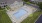 Aerial view of the pool at Pebble Brook Village Apartments