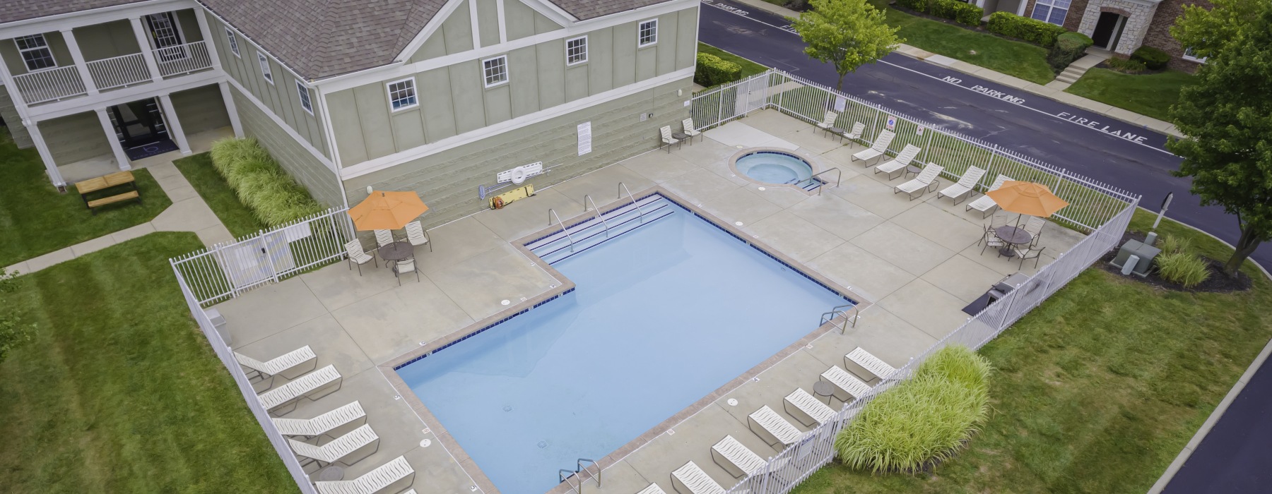 Aerial view of the pool at Pebble Brook Village Apartments