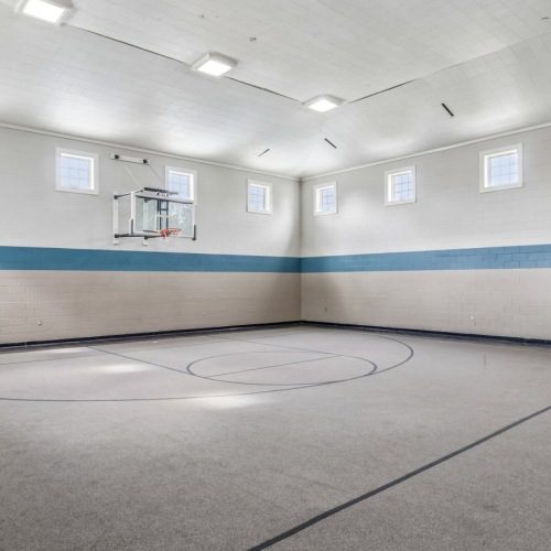 Indoor basketball court with windows